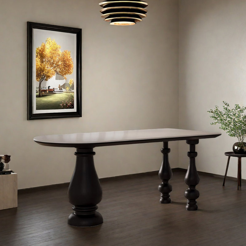 Une table avec un plateau en pierre et trois pieds, H 29,52 po x L 62,99 po x l 31,49 po