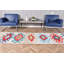 Chemin de table kilim turc fait à la main avec des motifs géométriques rouges et bleus vifs pour une décoration bohémienne