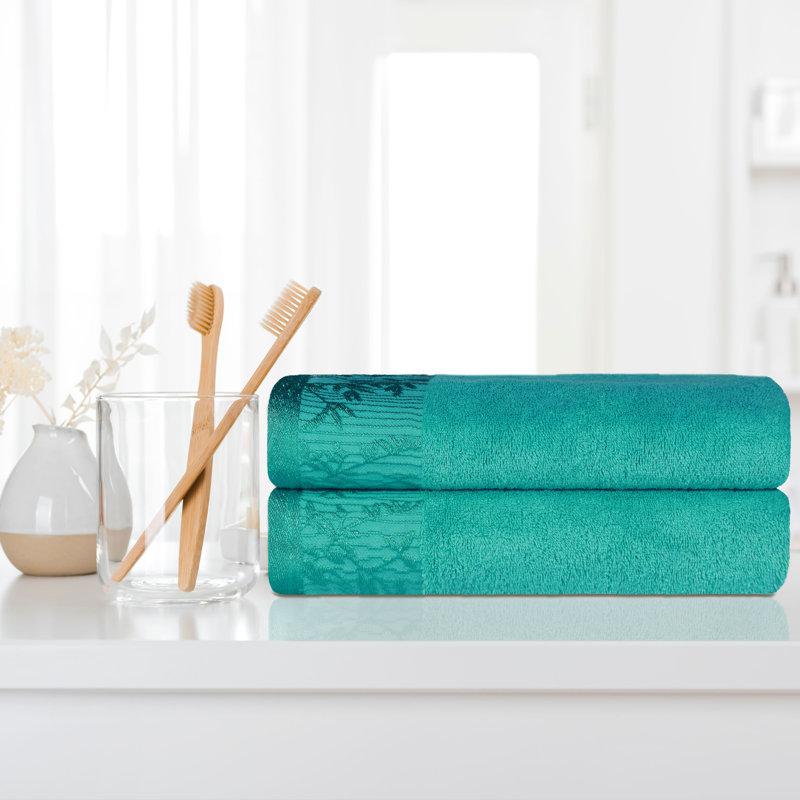 Ensemble de serviettes de bain en coton de poids moyen à bordure florale en jacquard pour la salle de bain Carinna, Turquoise