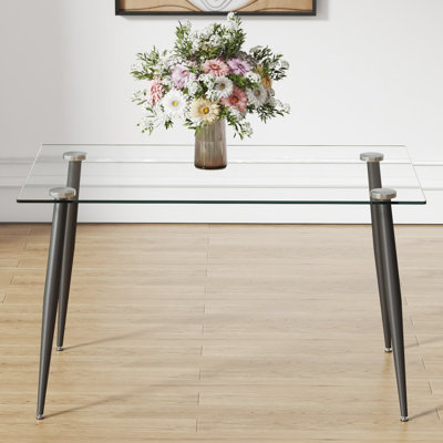 Table de salle à manger en verre avec pieds en métal noir, plateau trempé, pouvant accueillir de 4 à 6 personnes, facile à entretenir et à assembler, pour diverses pièces Construction stable de 4 à 6 personnes, assemblage propre, différent