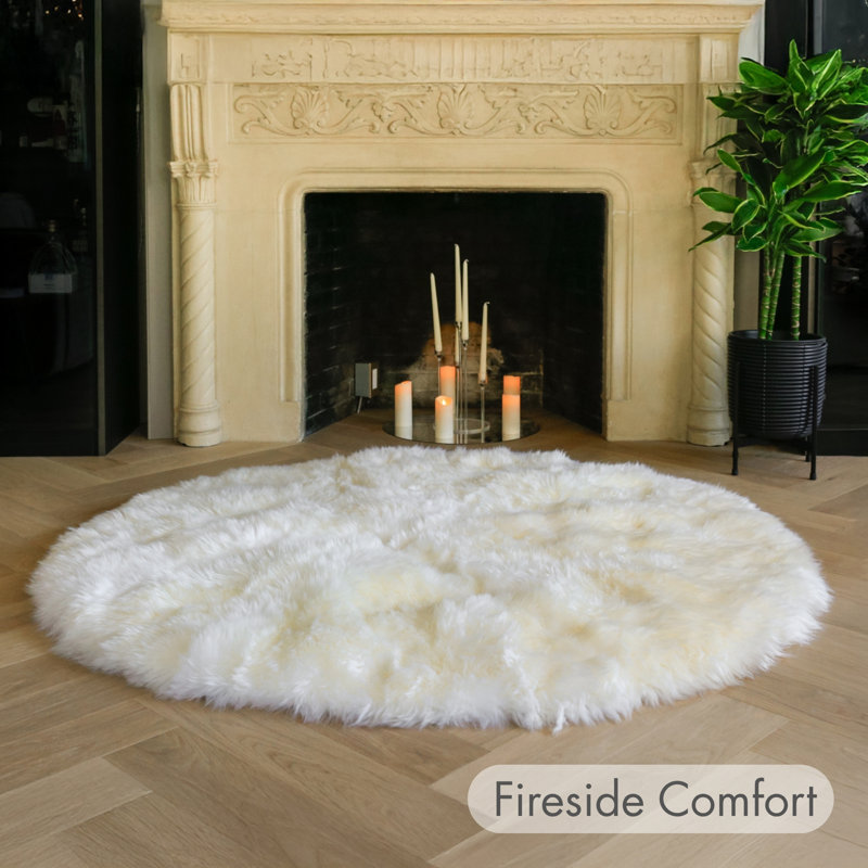 Round Colello Solid Color Handmade Sheepskin Area Rug in Natural, 5'