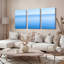 Ensemble de 3 tableaux muraux sur toile bleue dégradée représentant un horizon océanique-1714085855
