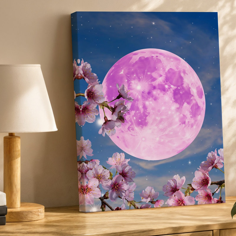 Toile Une scène de rêve avec de délicates branches de cerisiers en fleurs ornées de fleurs roses tendres sur fond de toile rose lumineuse