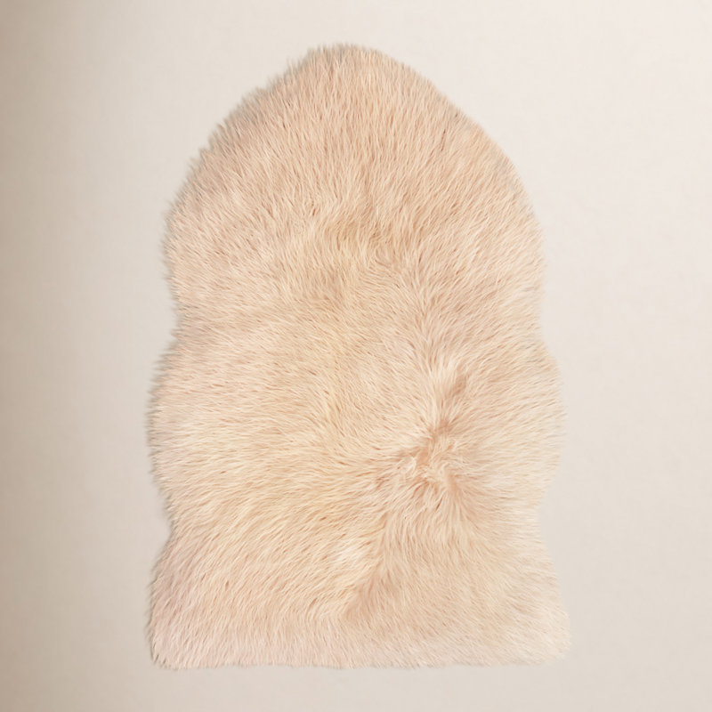 Tapis beige en peau de mouton Isilda
