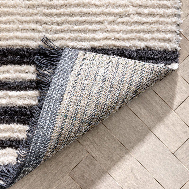 Ivory and Black Rectangular Synthetic Area Rug 5'3" x 7'3"