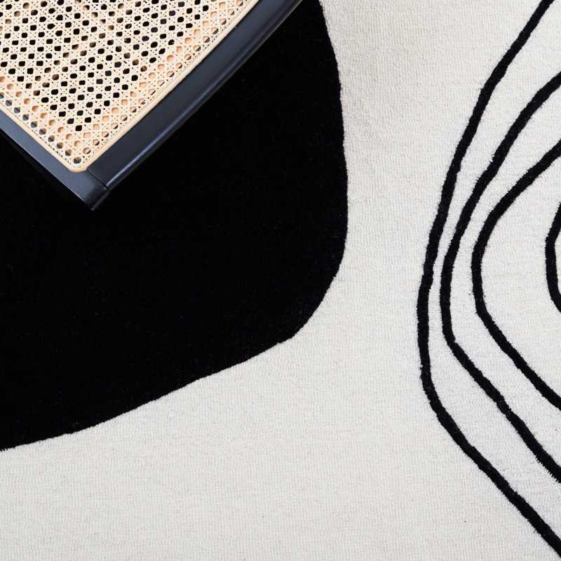 Black and Ivory Abstract Wool 4' x 6' Handmade Rug