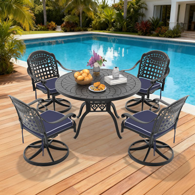 Ensemble de salle à manger de patio 5 pièces, table ronde de 47,24 po et 4 chaises pivotantes avec coussins bleus