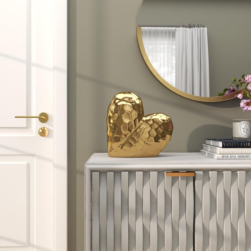 Ceramic heart-shaped decorative sculpture