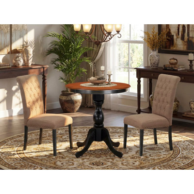 L'ensemble de table de salle à manger 3 pièces comprend une table de salle à manger ronde avec piédestal et 2 chaises rembourrées en tissu de lin sable noir et cerisier