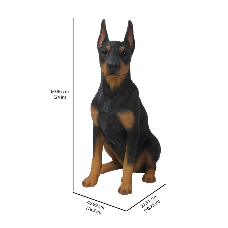 Statue de chien Doberman pinscher assis