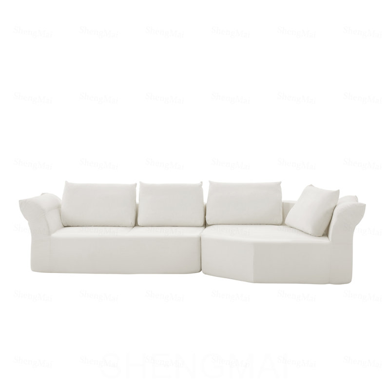 Canapé modulaire minimaliste, accoudoir à droite, accoudoirs larges et coussins décoratifs, canapé d'angle courbé élégant