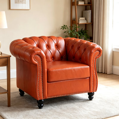 Fauteuil capitonné Chesterfield