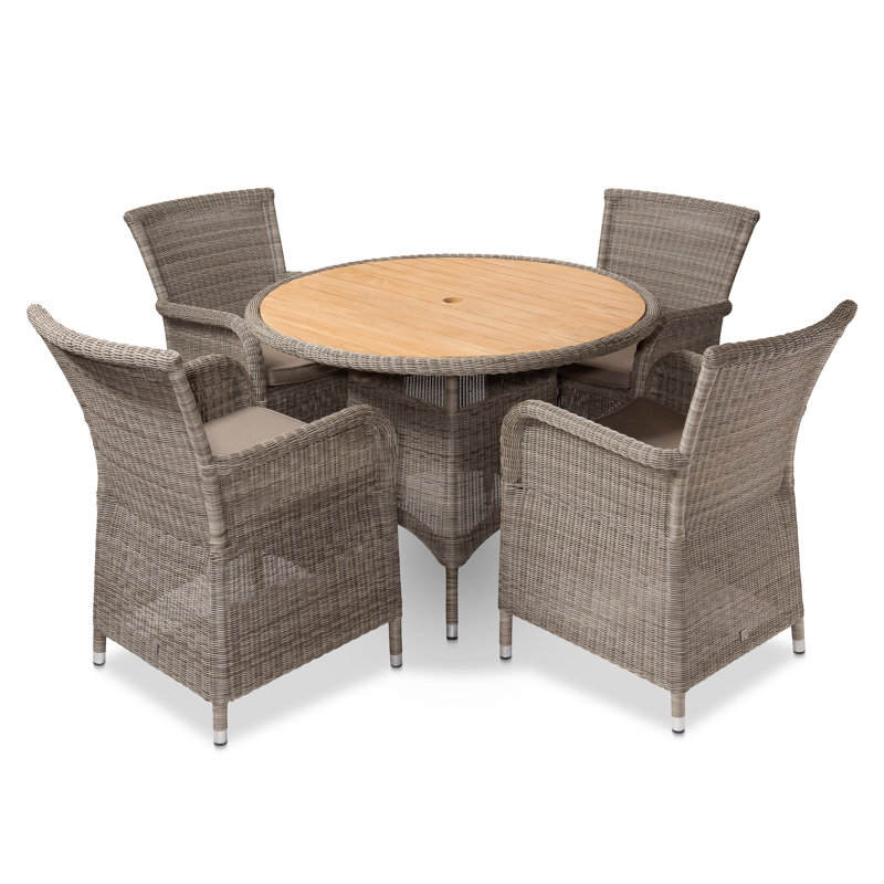Stafani 4 - Person Premium All-Weather Wicker Patio Dining Set with Round Table , Cushions Included