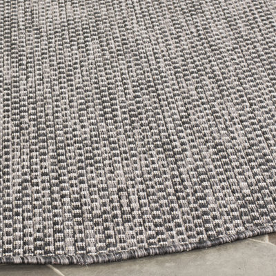 Tapis d'intérieur / extérieur de couleur unie Sezis Performance