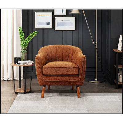 Fauteuil en chenille gris anthracite à 4 pieds, parfait pour le confort et la polyvalence de tout espace de vie