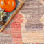 Tapis rouille / crème / rose tissé à la main à motif de glands Riser Southwestern-1626114497