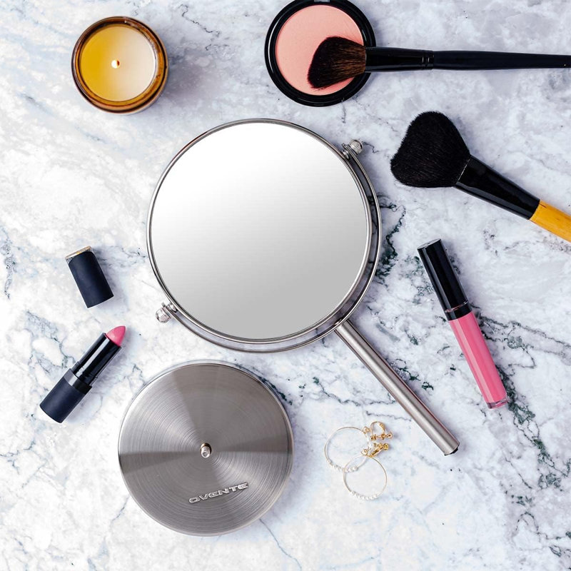 OVENTE 6'' Tabletop Makeup Mirror with 1X/7X Magnification, 360° Swivel Design, Double-Sided Free-Standing Vanity Mirror Perfect for Dresser, Bedroom and Office Desk, Nickel Brushed MNLT60BR1X7X