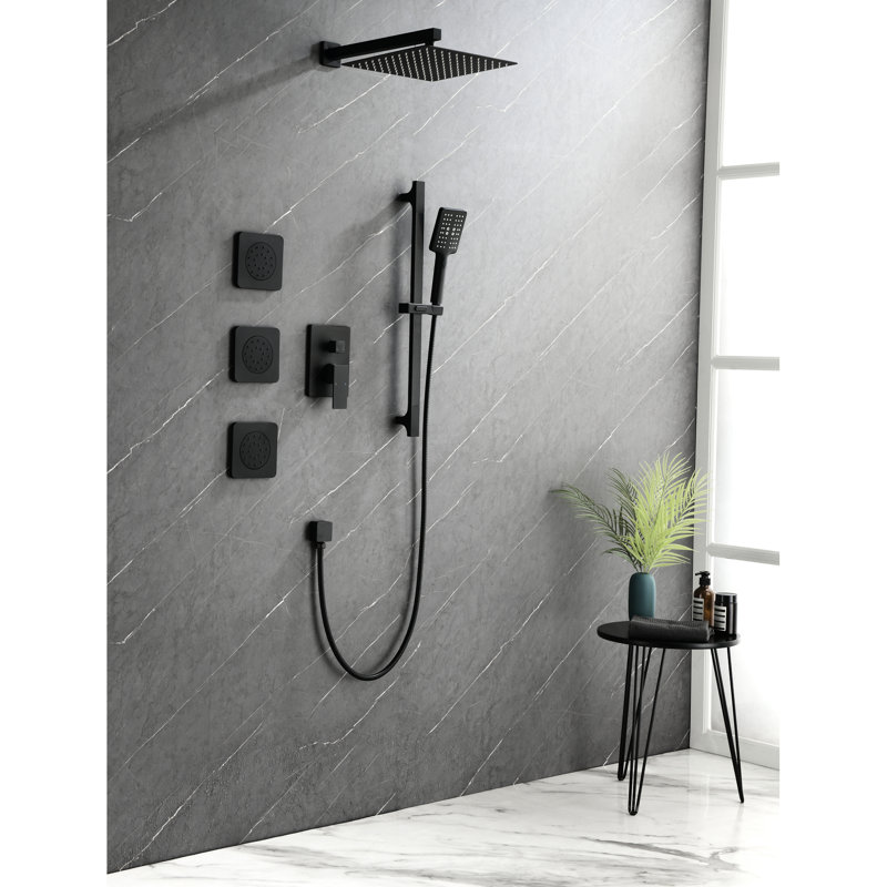 Shower System In Matte Black. Head, Hand Shower, Slide Bar, Bodysprays, Arm, Hose, Valve Trim, Lever Handles. Offers Natural Showering. Brass. Wall Mounted Black Kit With Self-cleaning Ability.