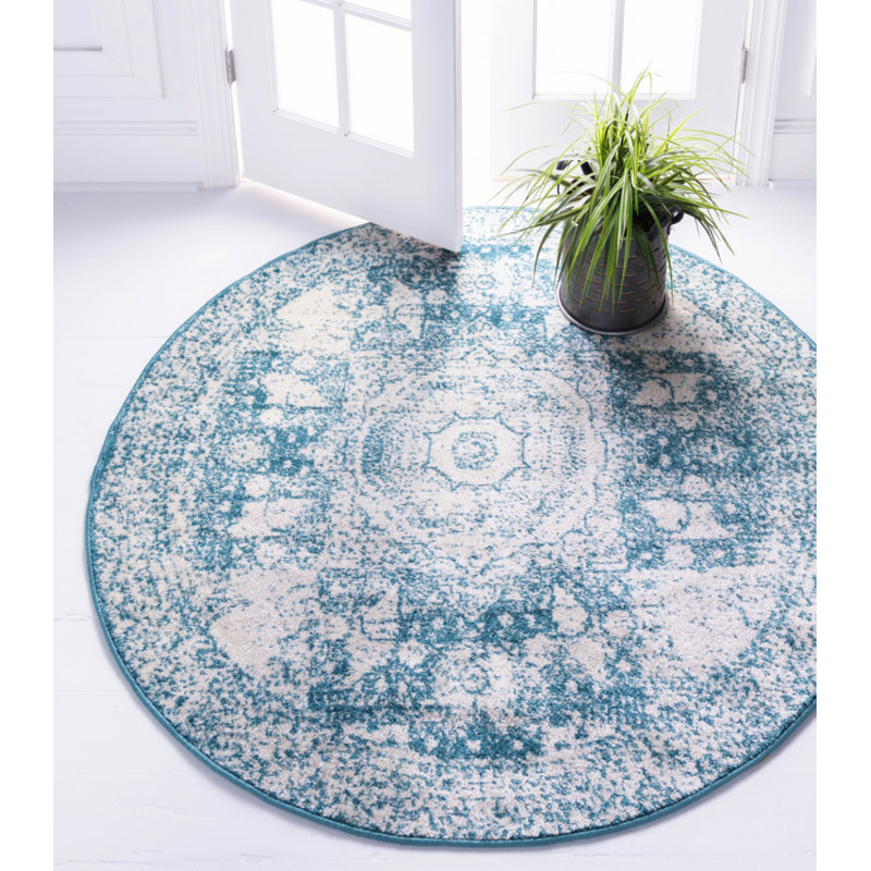 Tapis turquoise à motif géométrique Rizo, Rond 8 pi