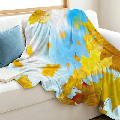 Jeté en flanelle transparente molletonnée, feuilles rouges et jaunes imprimées d'un côté