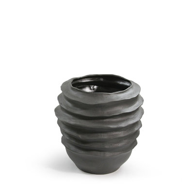 Pot à fleurs en céramique ondulé