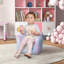 Canapé pour enfants avec fée brillante dans la salle de jeux