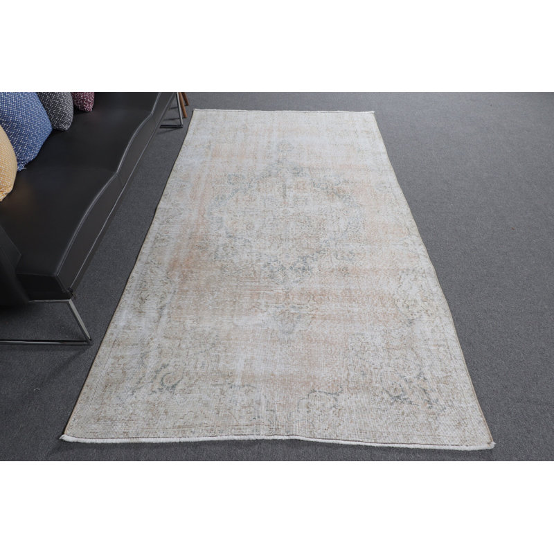 Tapis turc rétro de couleur pastel clair avec un motif délavé pour un décor de salon élégant et unique