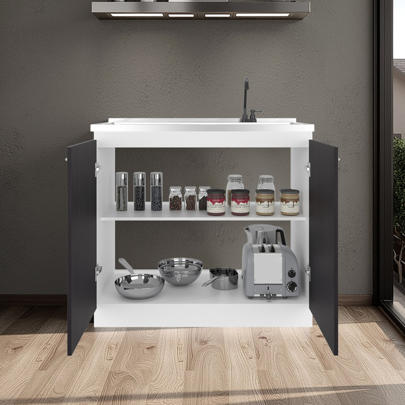 Évier utilitaire noir et blanc avec robinet et lavabo encastré noir et blanc