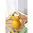 Compact and Stylish Yellow Plastic Side Table Stool, Perfect for Small Spaces and Modern Interiors.
