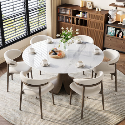 Trinity Bloom 7 Pcs Round Dining Table Set With Upholstered Chairs | Sintered Stone Travertine Top & Sculptural Wood Base