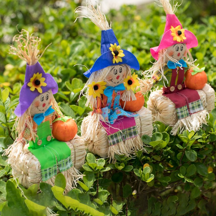 https://assets.wfcdn.com/im/04248035/resize-h755-w755%5Ecompr-r85/1535/153502299/Outdoor+Fall+Decor+Halloween+Scarecrow+For+Garden+Ornament+Sitting+On+Hay+Bale%2C+Straw+Multicolor%2C+Set+Of+3%2C+12+In..jpg