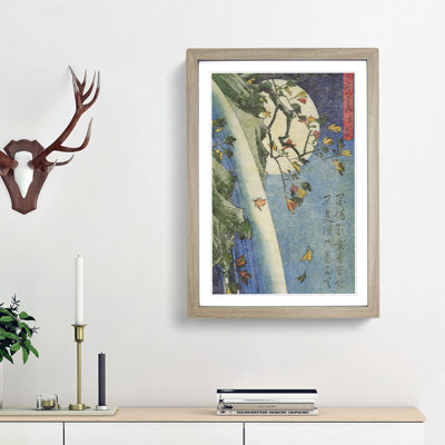 Moon over a Waterfall by Utagawa Hiroshige - Framed Print