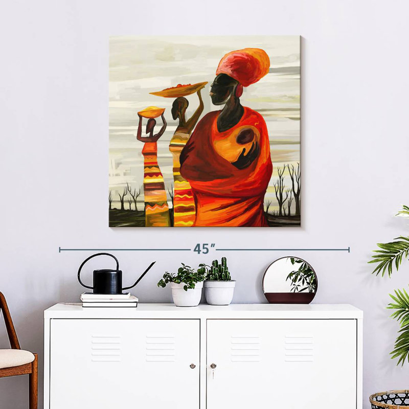 Femmes de Leisha habillées d'orange