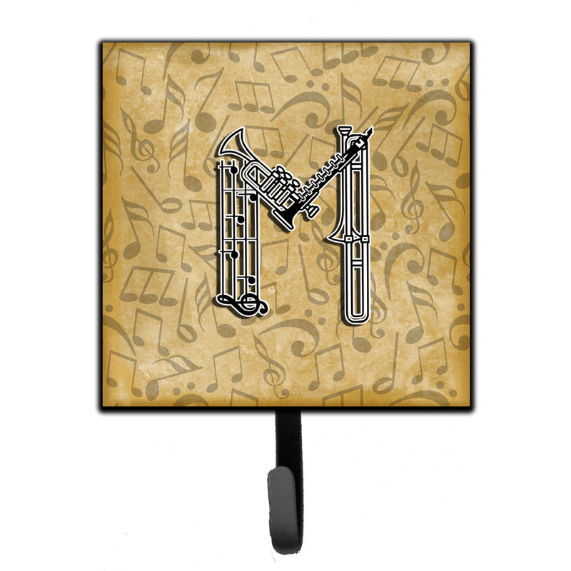 Porte-garde-bûche et crochet mural musical instrument, M