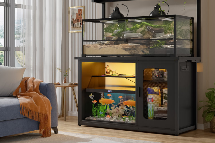 modern dual aquarium setup built into black cabinet with storage shelves