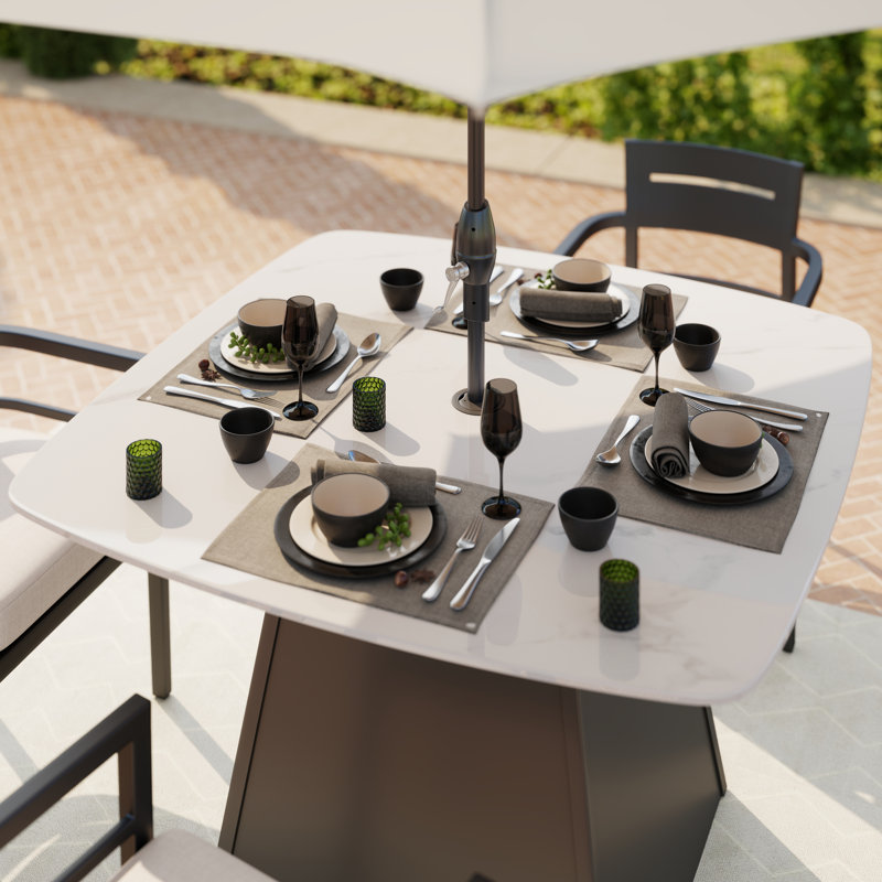 Ensemble repas carré blanc en aluminium 5 pièces avec coussins Sunbrella et 4 fauteuils
