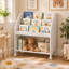 Bibliothèque mobile pour enfants à 3 niveaux de 23,6 pouces avec étagères d'exposition frontales, tablette de rangement inférieure et roulettes verrouillables
