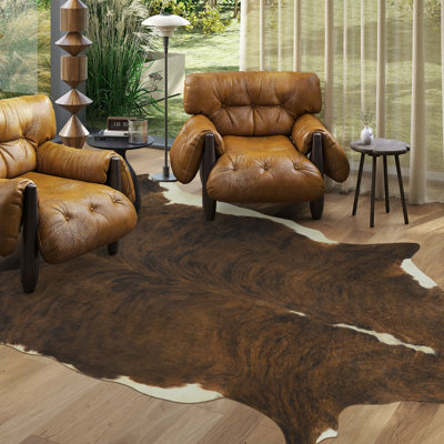 Faux leather animal print area rug for indoor use, suitable for living rooms, bedrooms, and studies.