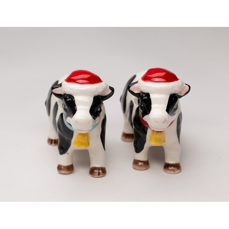 Ensemble de salière et poivrière de vache portant un chapeau de Noël Cosmos