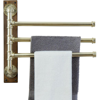 Porte-serviettes mural pivotant à 3 niveaux avec barres métalliques, base en bois et système pivotant. Ce modèle permet de ranger les serviettes de manière organisée et accessible, tout en apportant une touche industrielle rustique aux salles de bain et aux abords de la piscine.