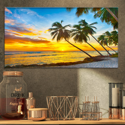 Palmier à la plage - reproduction de photo sur toile tendue