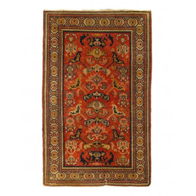 Melaku Oriental Area Rug in Rust