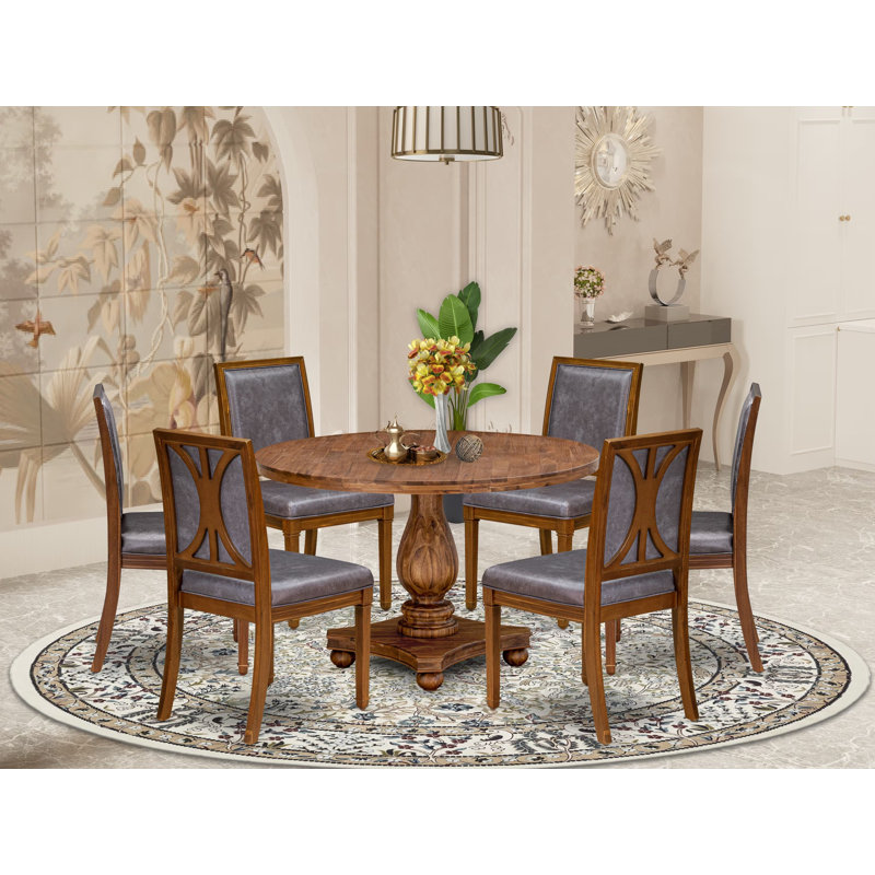 L'ensemble de salle à manger 7 pièces se compose d'une table ronde et de 6 chaises en similicuir gris foncé avec dossier élégant et finition noyer antique.