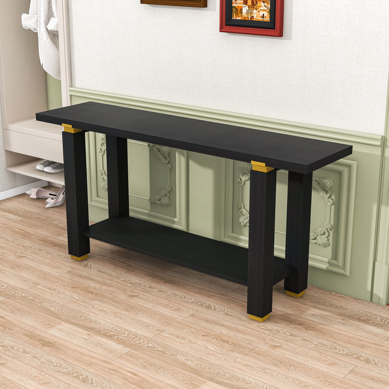 Console moderne avec tablette inférieure, pieds en bois massif et accents métalliques, Noir