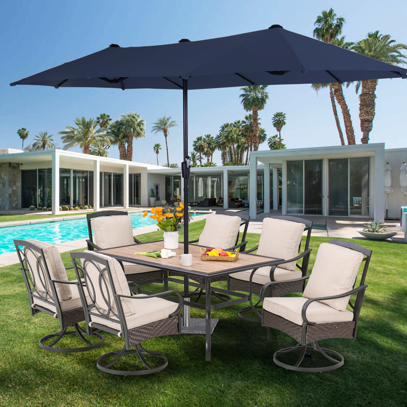 Leonard 6 - Person Wicker Patio Dining Set with Rectangular Table , Cushions Included, Navy Blue