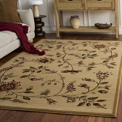 Tapis performance à motif floral Carolane