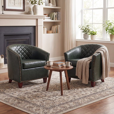 Fauteuil demi-tonneau en cuir moderne avec dossier capitonné à losanges et garniture cloutée