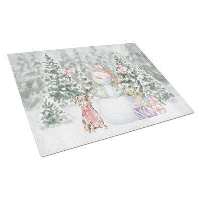 Teckel tacheté de cadeaux de Noël
