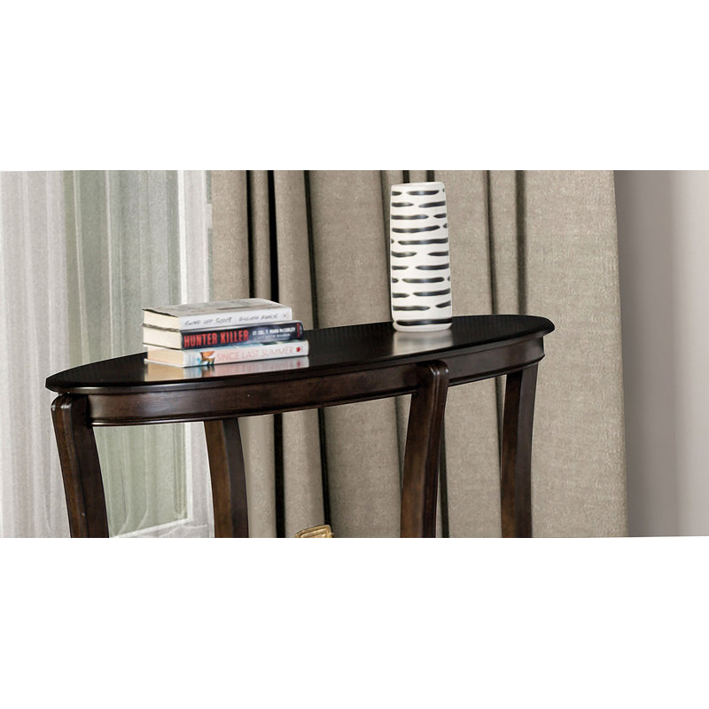 Table de canapé ovale de style traditionnel avec tablette de rangement inférieure ouverte et pieds courbés, finition noyer