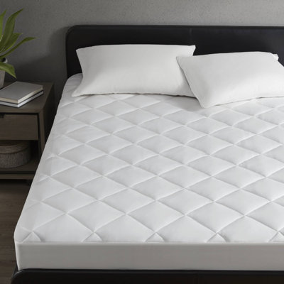 Protège-matelas toutes saisons avec bourre